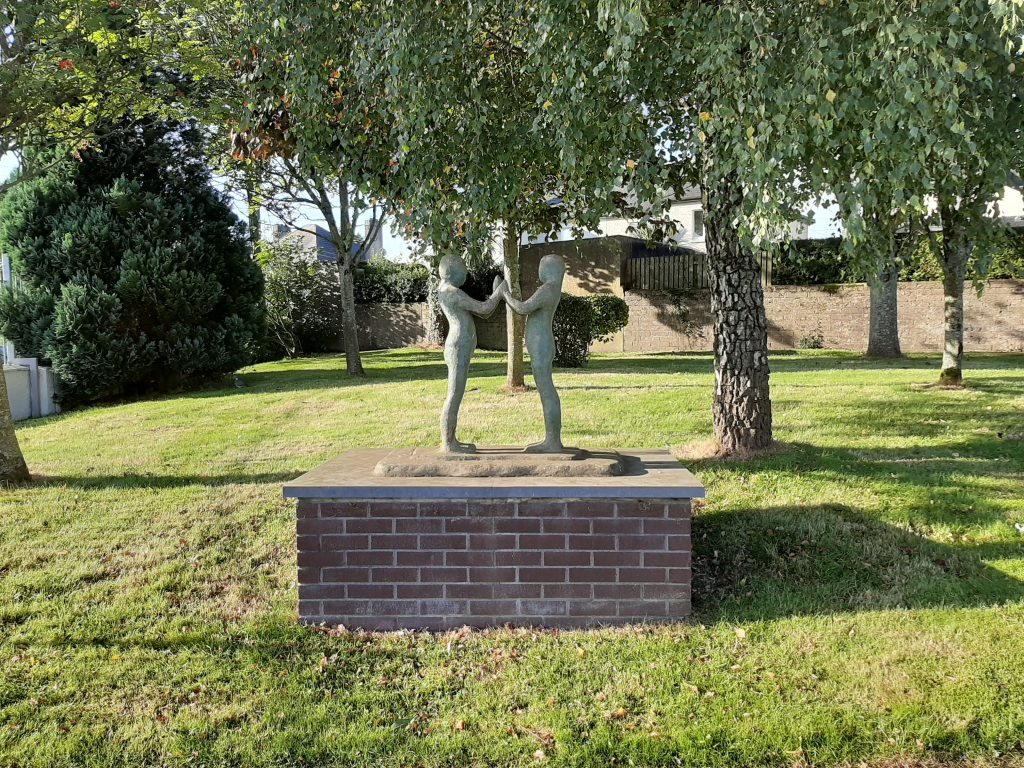 Sculpture at the front of the school